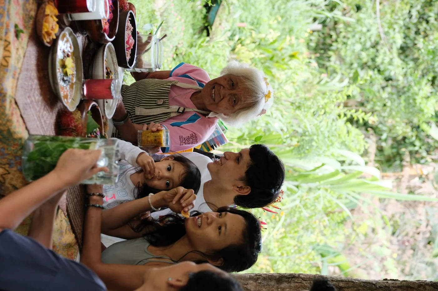 Community gathered around the farm feast table